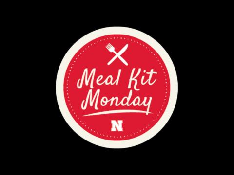 Text " Meal Kit Monday" Red circle logo with clipart of a knife and a fork